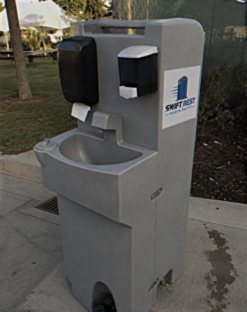 Restroom hygiene supplies and dispensers